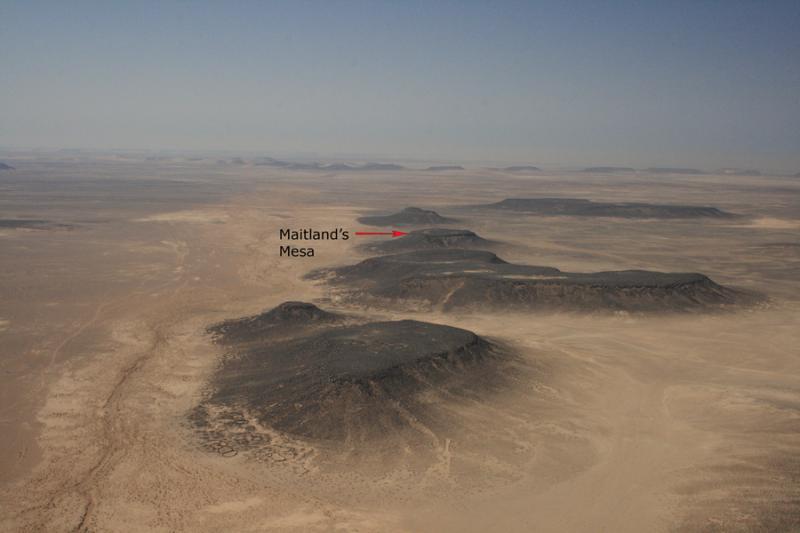 Fig. 32. Area of basalt-capped plateaus along Wadi al-Qattafi, looking south toward Maitland's Mesa (I. Ruben).
