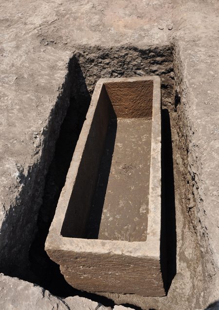 Fig. 2. Gabii, Area D, Tomb 25, view of tuff sarcophagus after removal of the human remains found inside it and of the fill of the tomb around it, from the south.