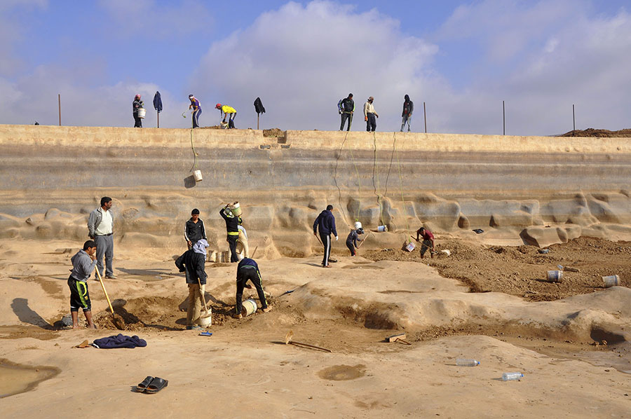 Fig. 4. Removing sediment from the floor of Umm el-Jimal’s Roman reservoir.