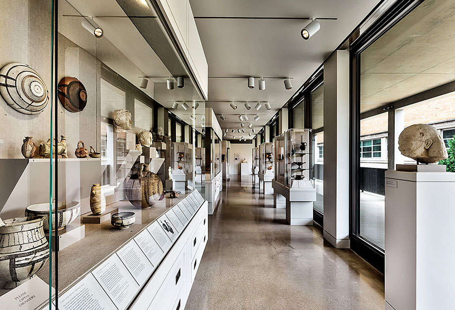 Fig. 1. View of the first floor galleries of the Upjohn Wing of the Kelsey Museum. Note the drawers with additional materials installed below the vitrines (courtesy HBRA Architects Inc. and M. Ballogg, Ballogg Photography).
