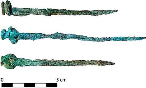 Fig. 7. Copper alloy pins (top to bottom: SF0669, SF0670, SF0671) from Tomb 11.