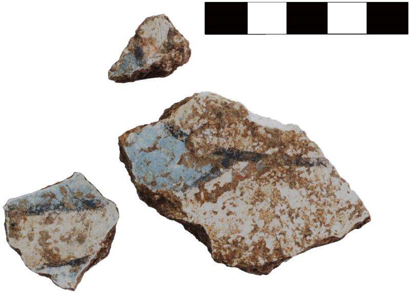 Fig. 5. Joining fragments (3055–10, 3055–15) of painted wall fresco, with blue, white, and black decoration, from area D-South.