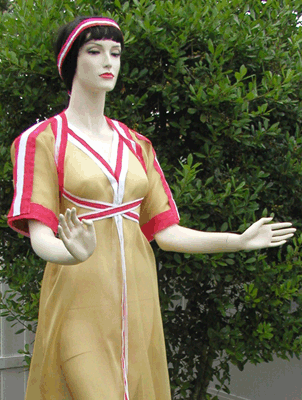 Fig. 28a. Experimental replication by the author of the blouse and dress (heanos) of Mykenaia, based on reconstruction C, three-quarter view.