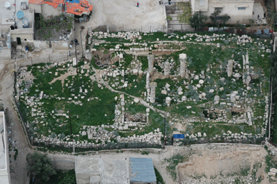 Fig. 5. Khirbet es-Suq, 8 km south of central Amman, showing the standing Ionic columns of a suspected Roman temple in an area of well-preserved monumental Roman mausolea.
